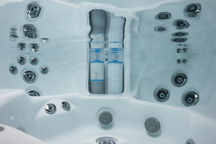 clean hot tub filters in a jacuzzi hot tub